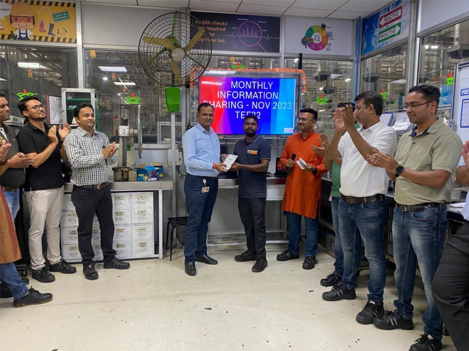 Recognition at a monthly information sharing meeting